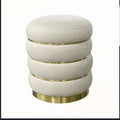 ROUND CURVY POUF WITH GOLDEN ACCENTS